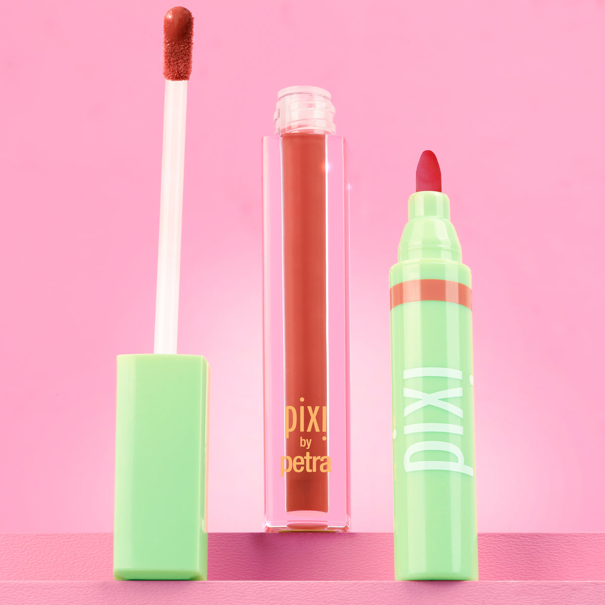 Pixi Signature Duo featuring LipBlush and LipLift Max on a pink background -